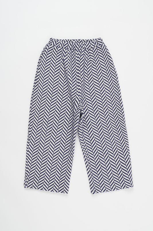 BLACK AND WHITE TROUSERS 8Y