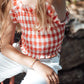 RED RUBBERIZED GINGHAM TOP